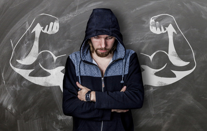 Man in Front of Arms Drawing